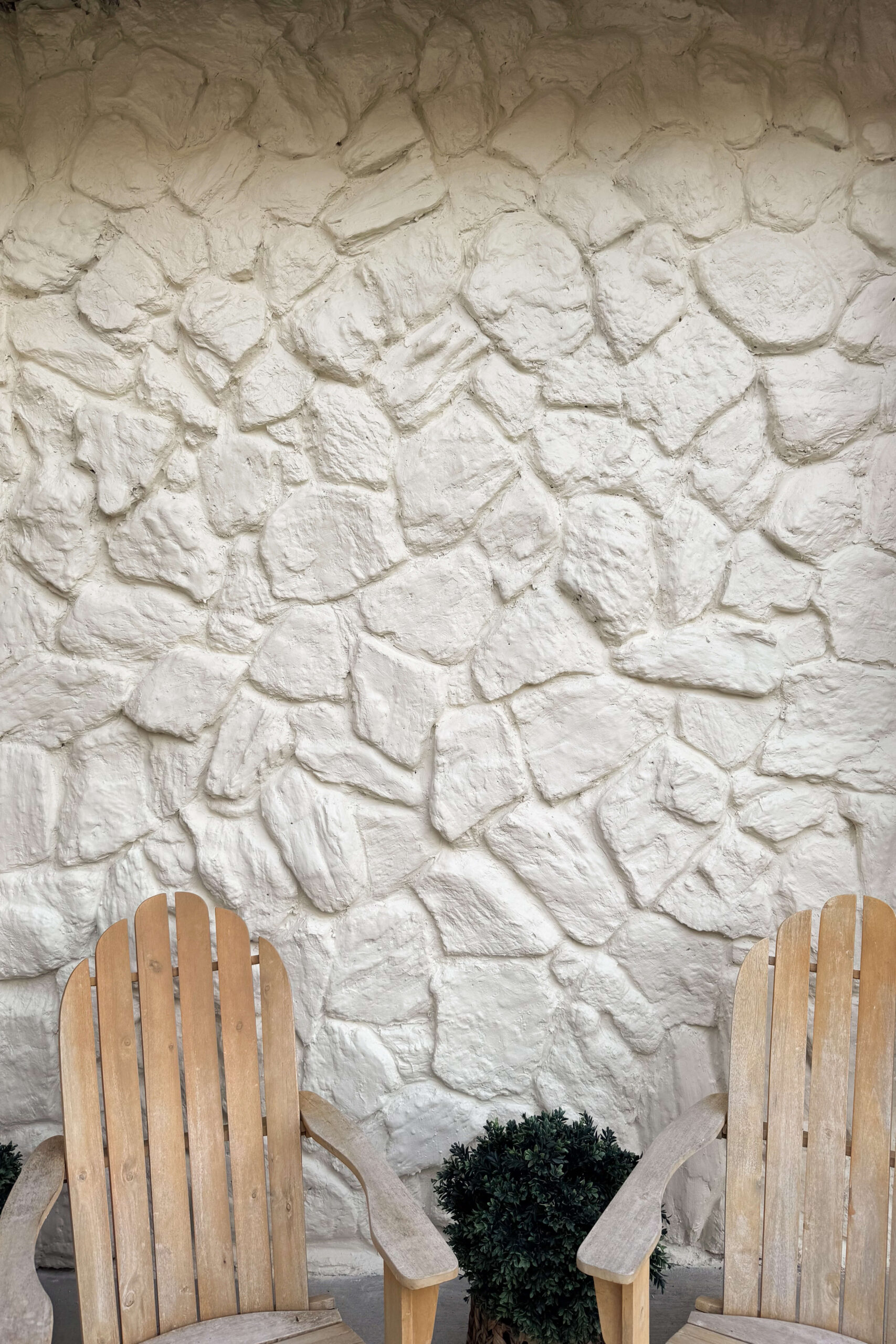 Before and after pics of my updated, 1970s rock wall.