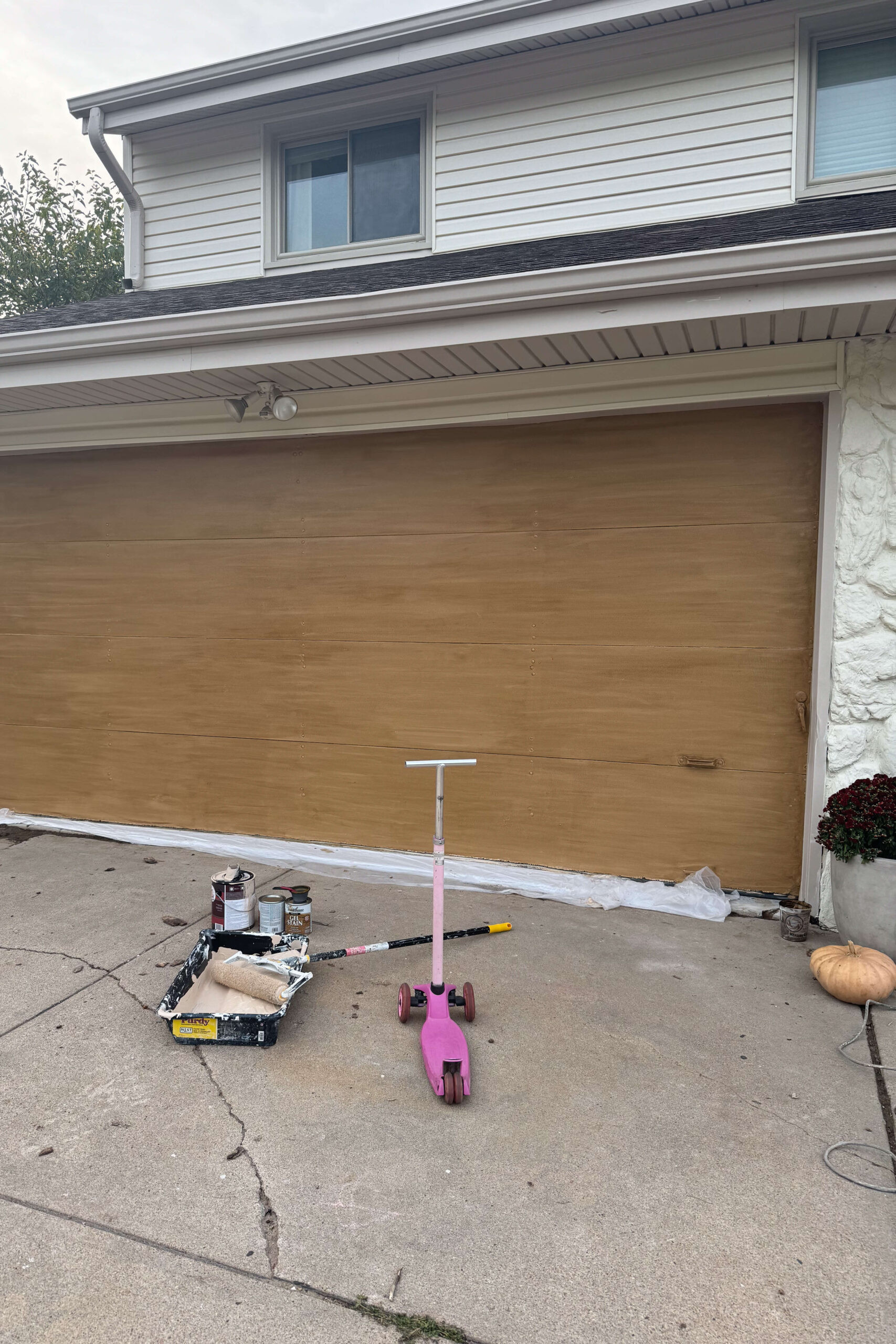 A garage door after using a painting technique.