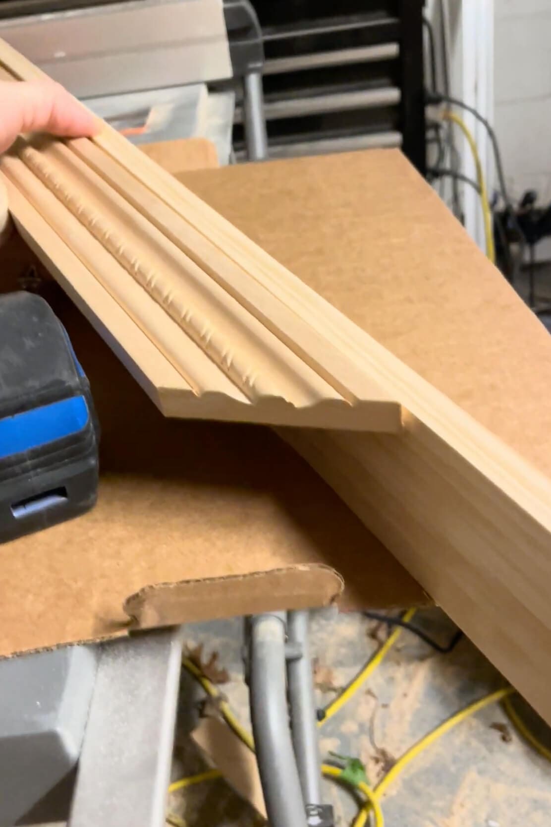 Close-up of decorative wood trim used to build a DIY picture frame for a handmade present.