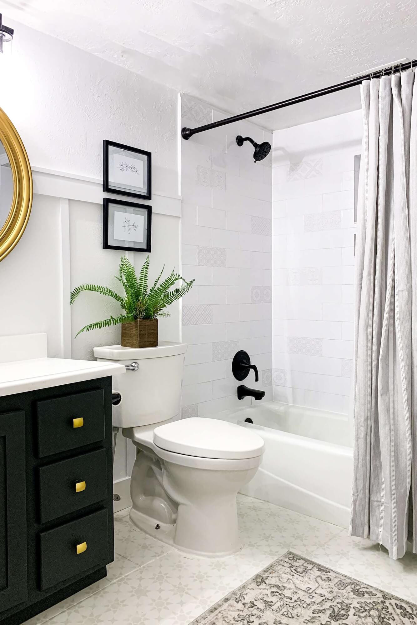 Bathroom makeover with painted vanity and updated shower