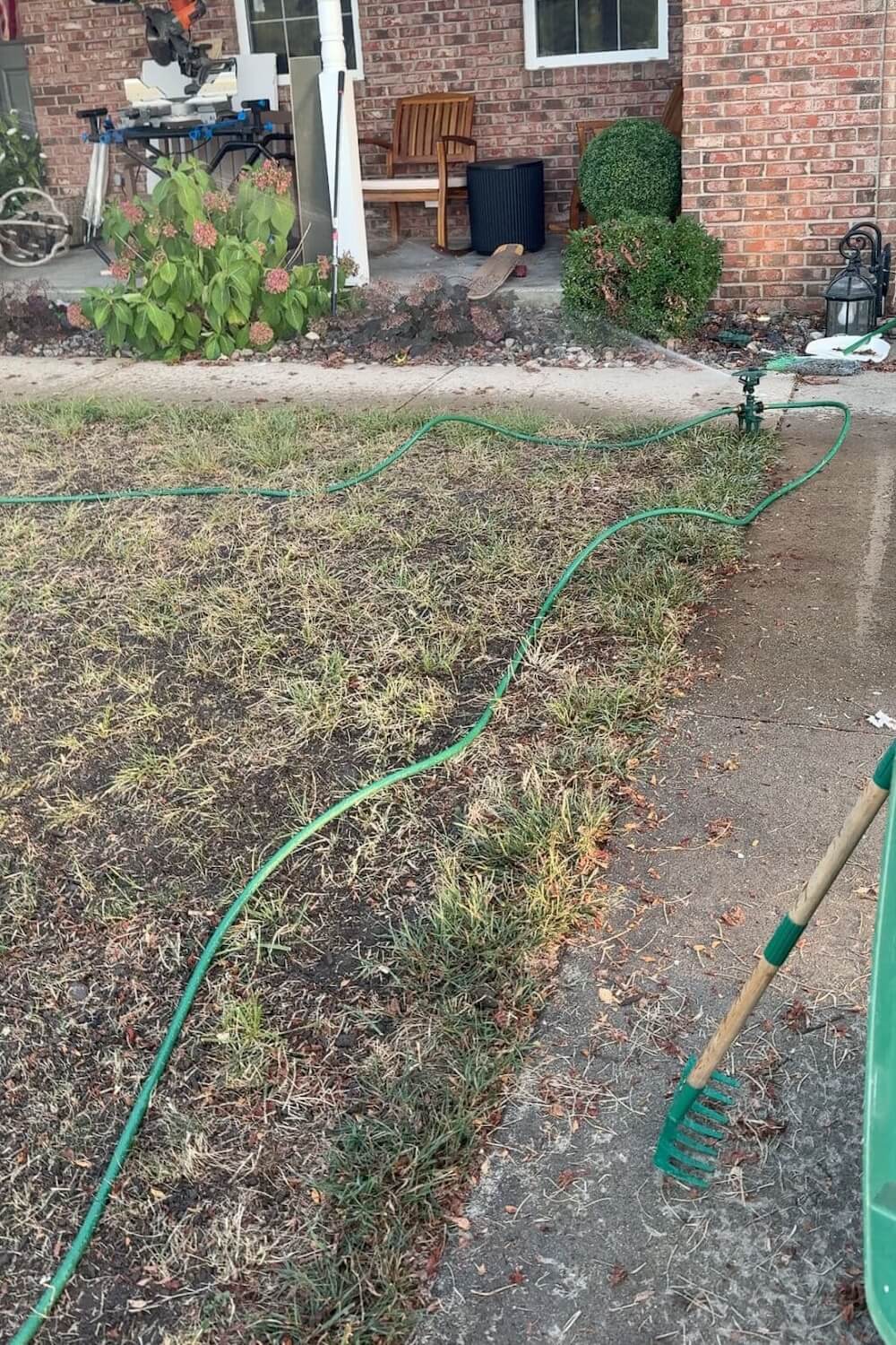 installing a sprinkler to water new seed