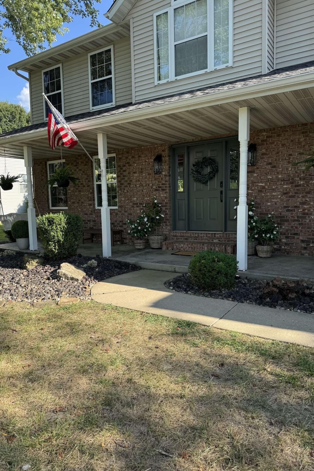 patchy front lawn before reseeding