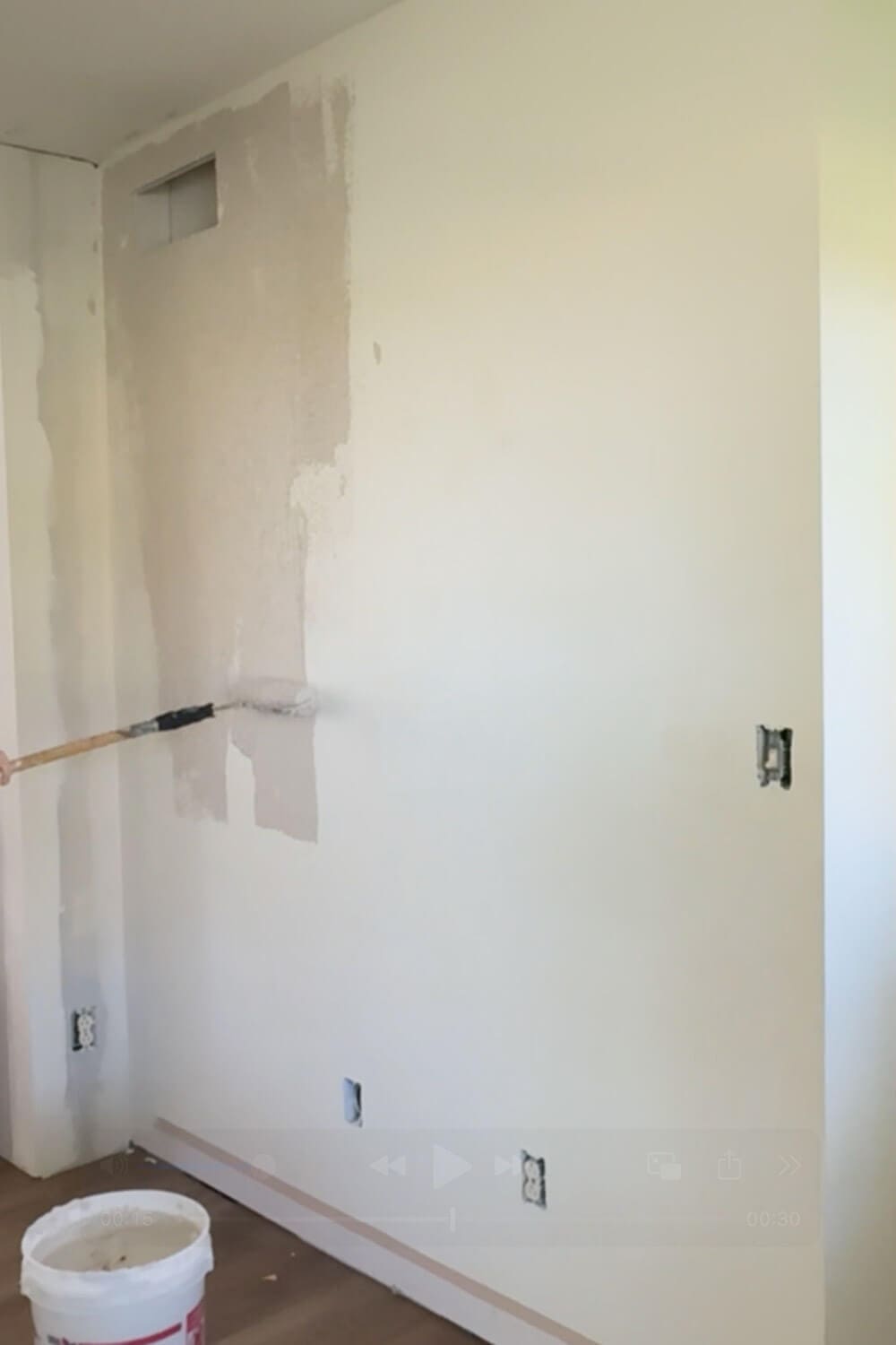 How to skim coat a wall: rolling thinned joint compound to cover orange peel texture as the first coat