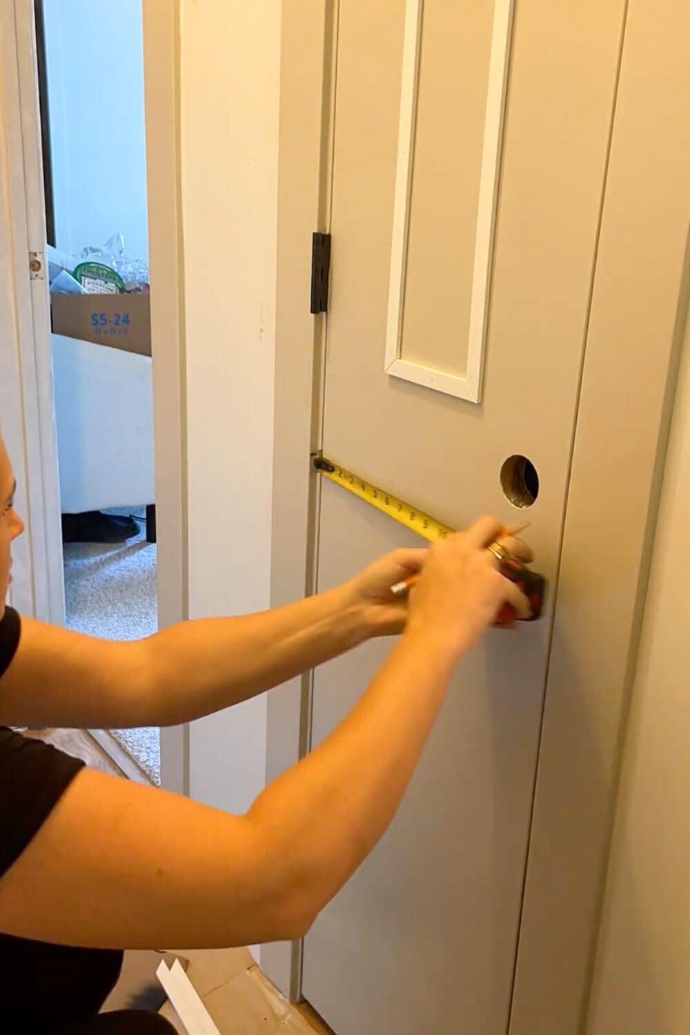 Measuring lower trim frame placement on interior door upgrade