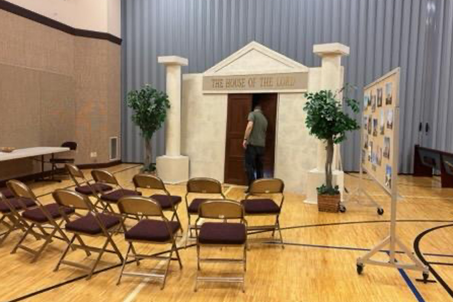 Easter church activity for kids temple station with House of the Lord display, seating area, and church gym setup for Walk to Easter event