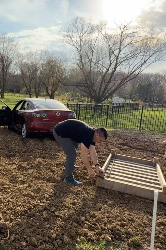 DIY method for smoothing out fill dirt on low spots in the yard.