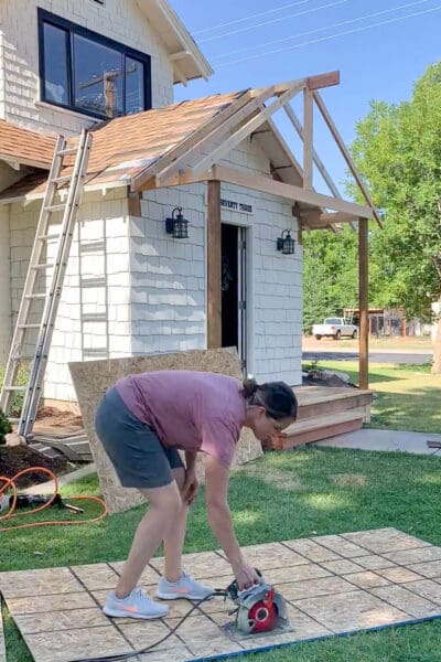 Cutting OSB panels on ground before installing on DIY porch roof