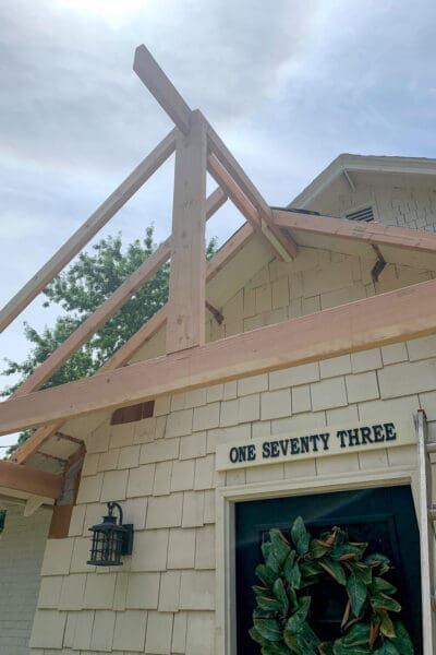 Finished rafter skeleton showing proper spacing for building a porch roof deck