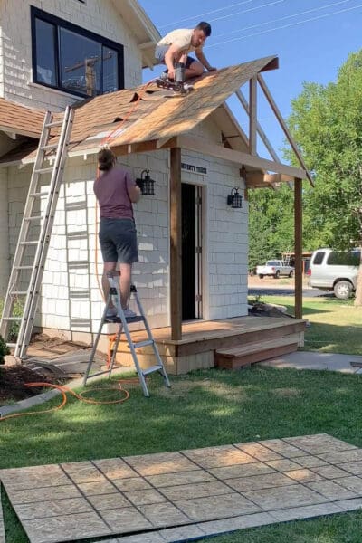 Complete OSB roof deck installed on porch roof frame structure