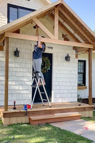 Installing decorative craftsman gable bracket pieces in porch roof peak