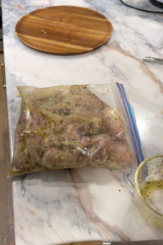 thighs marinating in the lemon-oregano garlic marinade an easy summer dinner