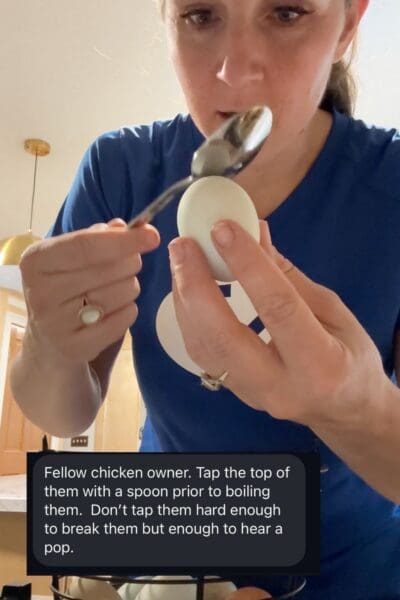 Crystel tapping the top of a fresh egg with a spoon before boiling, with an overlaid reader tip explaining to tap just hard enough to hear a pop, part of testing the tap method for hard boiling fresh eggs so they peel easily.