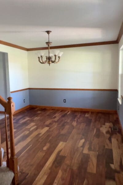 Formal dining room before being transformed with wall to wall bookshelves in a makeover.